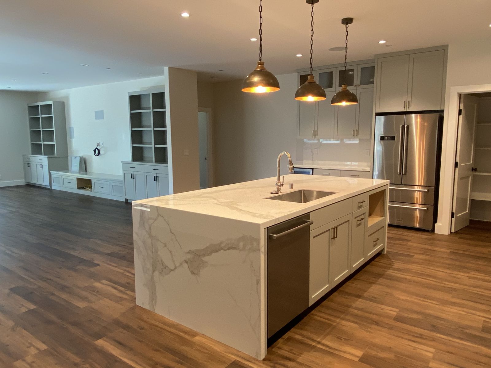 Kitchen remodel - marble waterfall island - Howard Construction Inc.